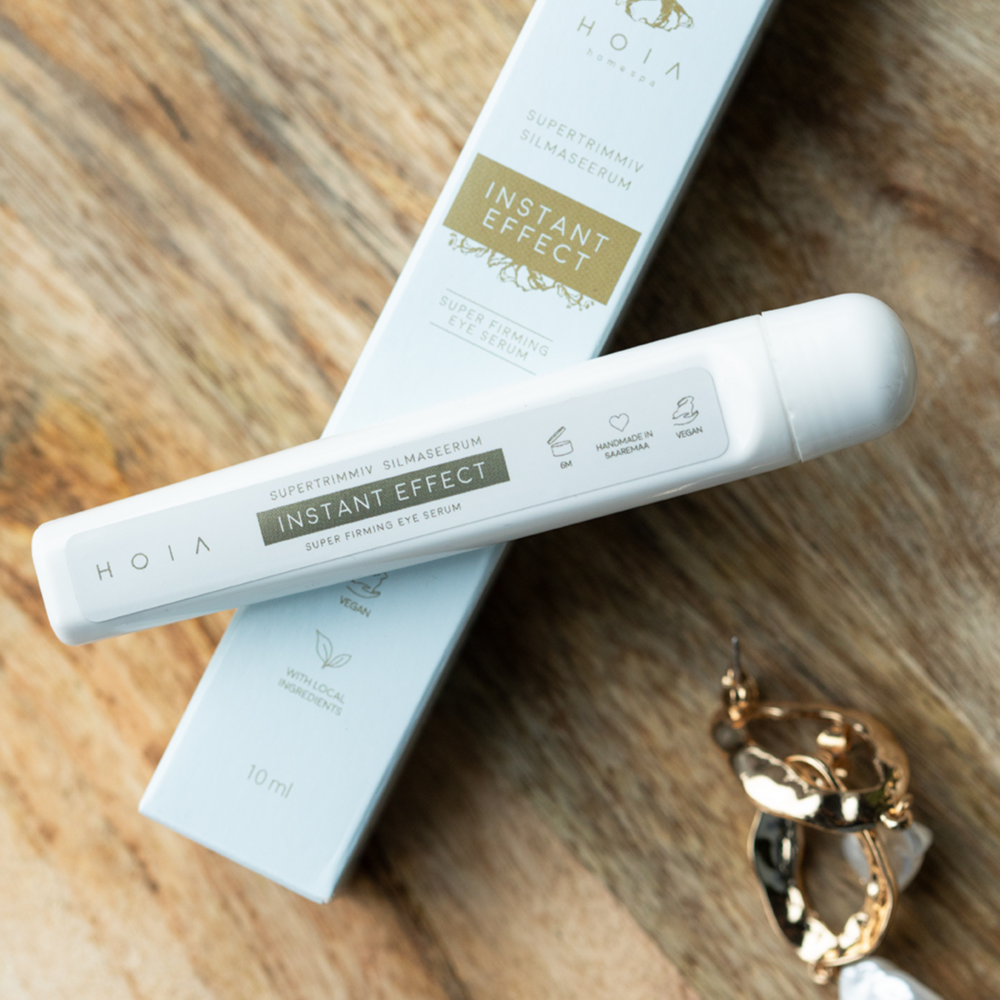 Superfirming Eye Serum 10ml dropper bottle labeled Superfirming Eye Serum with botanical hydrosols and dropper cap made in Estonia