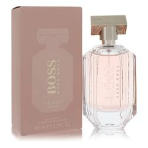 Boss The Scent 3.3 oz Eau De Parfum bottle with amber liquid black cap by Hugo Boss