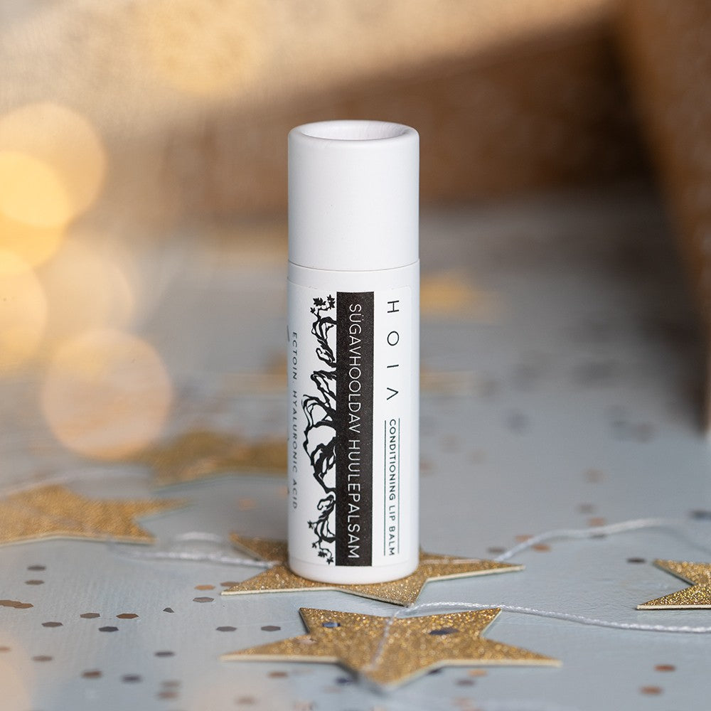 Conditioning Lip Balm with Ectoin 12ml tube labeled Ectoin hyaluronic acid and nourishing oils