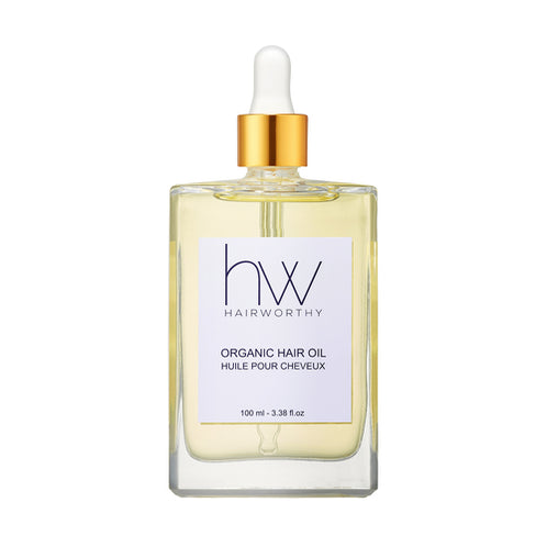 Hairworthy Hairrepair Coconut oil bottle labeled five-oil blend coconut argan jojoba almond vitamin E non-greasy