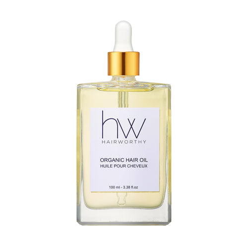 Hairworthy Hairrepair Coconut oil bottle labeled five-oil blend coconut argan jojoba almond vitamin E non-greasy