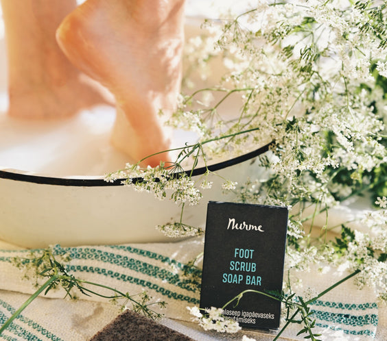 Foot Scrub Soap 110g bar with visible pumice granules and almond shell particles for exfoliating feet