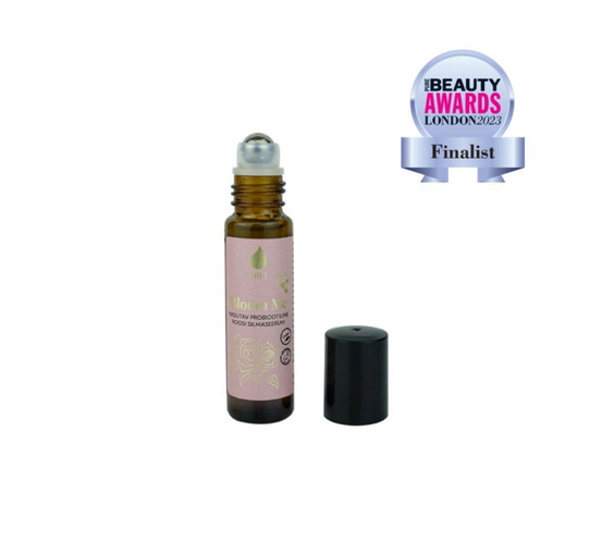 Bloom Me 10ml Probiotic Rose Eye Serum bottle labeled hyaluronic acid provitamin B5 natural vegan